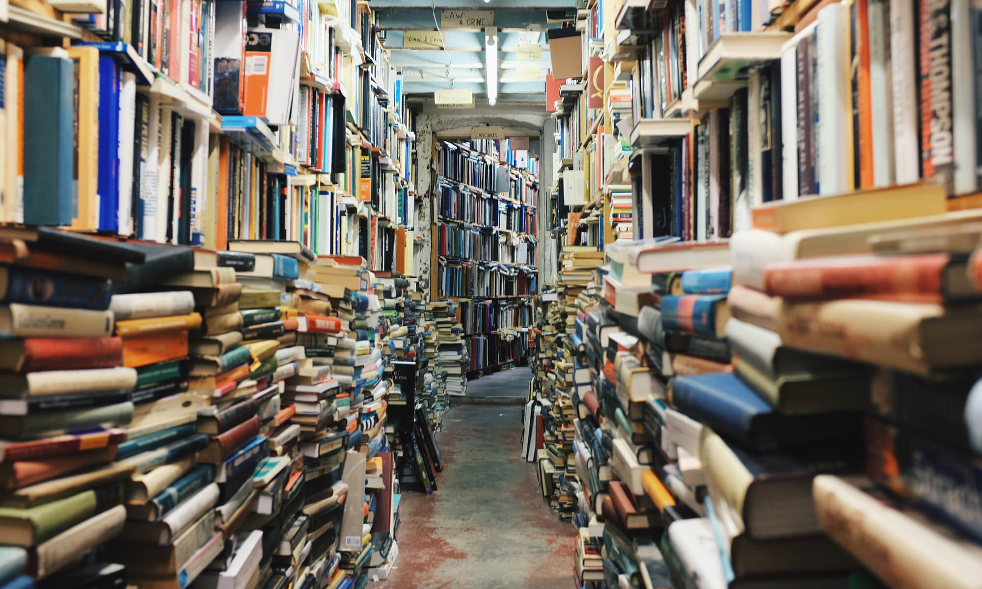 image of stacks of books in a ilbrary