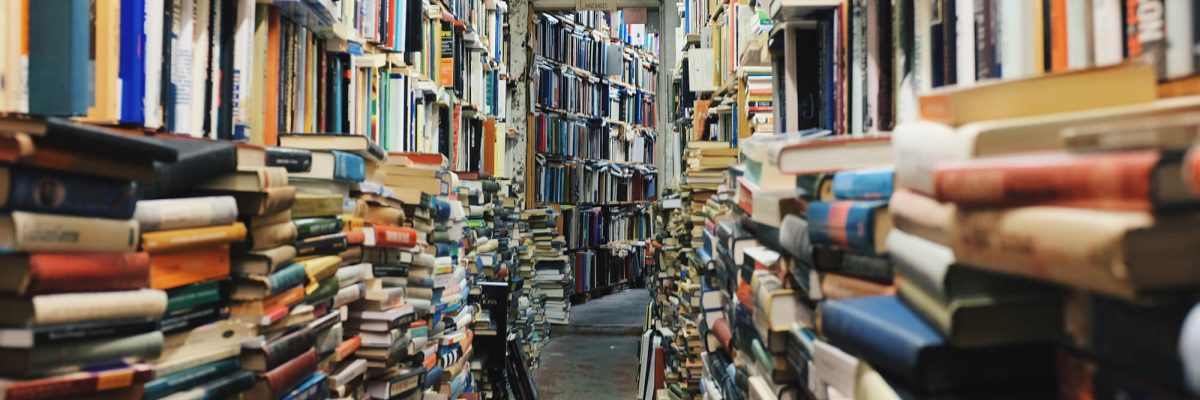 image of stacks of books in a ilbrary